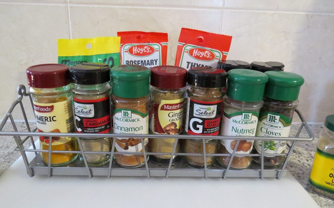common spices on a kitchen spice rack