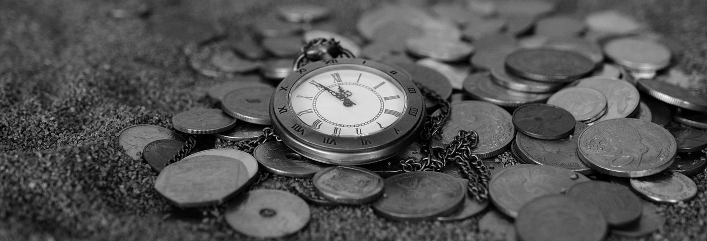 pocket watch and coins